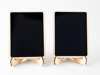 Obraz premium Pair of blank Black chalkboards for mock ups on a white background