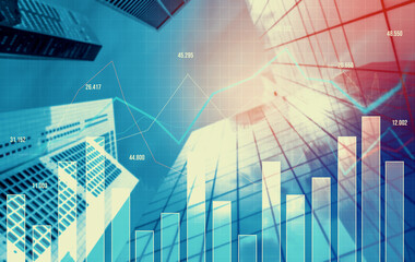As background for a financial or business concept, digital screen and financial graphs overlap on a picture of modernistic cityscape, skyscrabbers.