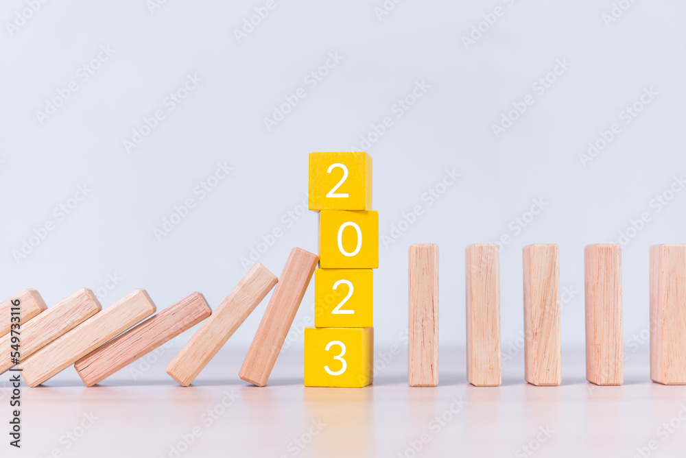 Aufkleber stack of wood cube building block with text 2023 stop falling continuously of wood bar row , happy new year concept