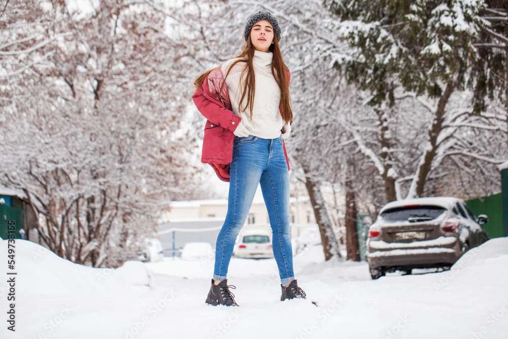 Wall mural Full length portrait of young beautiful woman