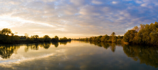 Panoramic aerial view of scenic sunset above Sava river, Zagreb, Croatia.