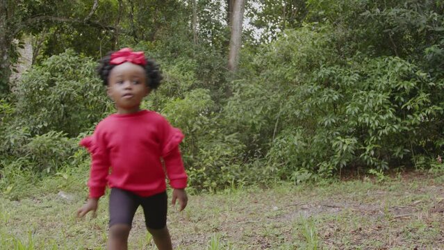 Toddler playing in nature 