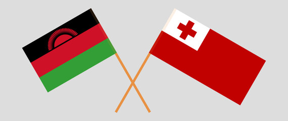 Crossed flags of Malawi and Tonga. Official colors. Correct proportion