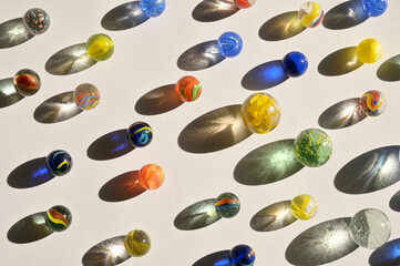 Closeup of a bunch of marbles and shadows