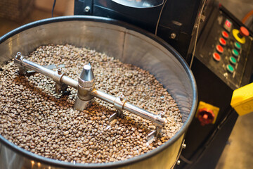 coffee beans roasting in machine