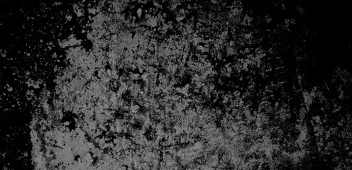 Fototapeta na wymiar Black cement concrete wall background texture with cracks to show visible mysterious background.