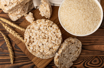 Rice bread on a brown background. Rice cakes. Diet bread on the table.Healthy food without yeast.Place for text. Place to copy. Healthy food. dietary product.