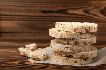 Rice bread on a brown background. Rice cakes. Diet bread on the table.Healthy food without yeast.Place for text. Place to copy. Healthy food. dietary product.