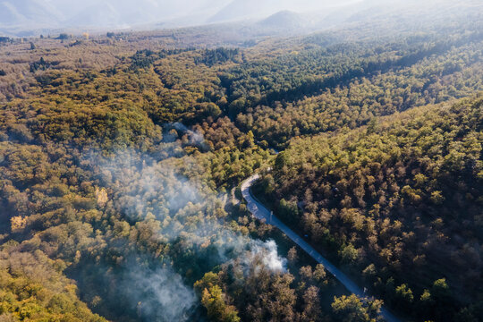 Aerial view of a fire along the road on Terminio mountain, Avellino, Irpinia, Campania, Italy.