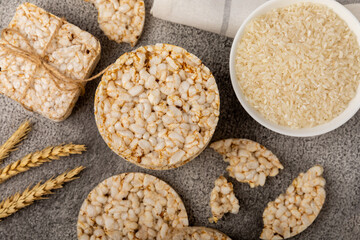 Rice cakes on a black table. Bread. Airy rice bread. dietary crispy round rice cakes. Place for text. Place to copy. Healthy food. dietary product.