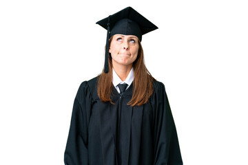 Middle age university graduate woman over isolated background and looking up