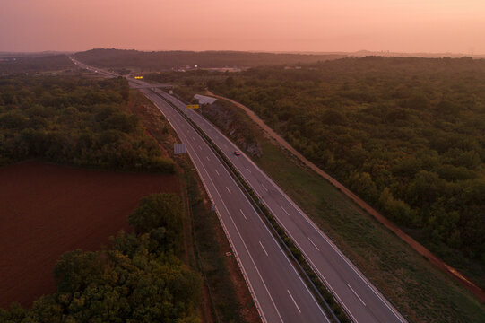 Aerial view of empty motorway in southern Istria in Croatia in the evening at sunset.