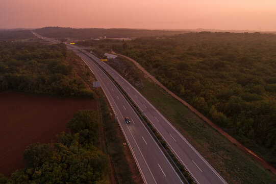 Aerial view of empty motorway in southern Istria in Croatia in the evening at sunset.