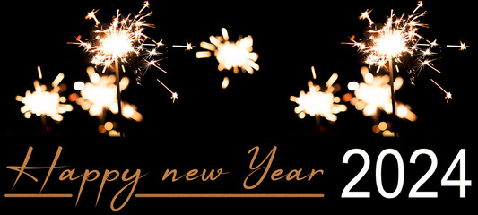 Happy new Year 2024 celebration background banner panorama long holiday greeting card - Many sparklers in the dark black night.