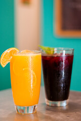 Fresh orange and blackberry juice