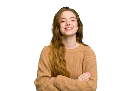 Young caucasian redhead woman isolated who feels confident, crossing arms with determination.