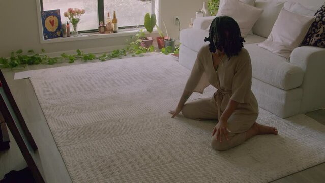 Young woman practicing mindfulness through movement and dance