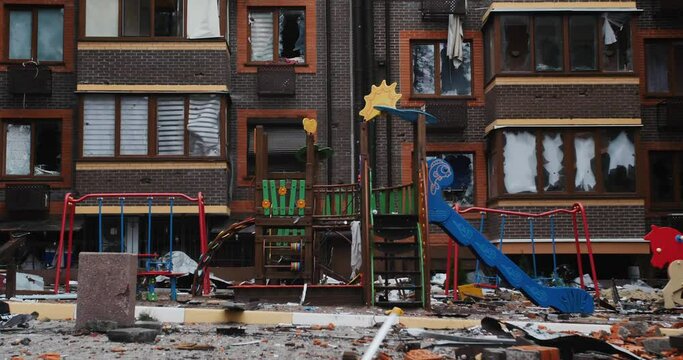 Broken items after the military invasion. Destroyed playground. Bombed cities and damaged buildings because of the war. High quality 4k footage