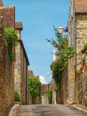 Domme in Dordogne. Royal Bastide and fortified village in Périgord Noir with narrow streets and...