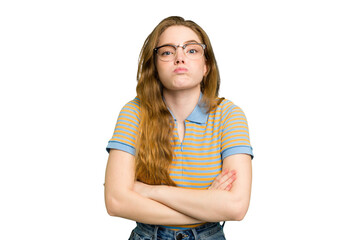 Young caucasian redhead woman isolated blows cheeks, has tired expression. Facial expression concept.