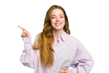 Young caucasian redhead woman isolated smiling cheerfully pointing with forefinger away.