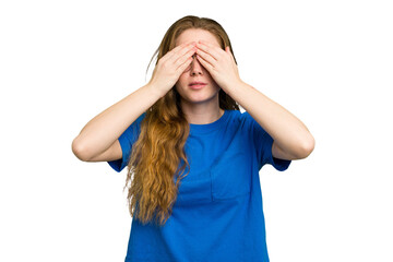 Young caucasian redhead woman isolated afraid covering eyes with hands.