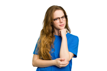 Young caucasian redhead woman isolated thinking and looking up, being reflective, contemplating, having a fantasy.