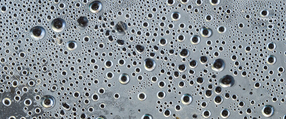 background of water droplets on clear plastic