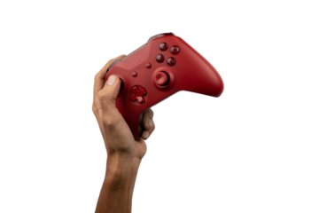 Hand holding a game controller on transparent background