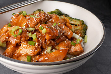 Delicious sweet chopping chicken rice, sesame seeds, sliced spring onions, broccoli, and vegetables. Asian food, Japanese food