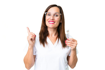 Dentist caucasian woman over isolated chroma key background showing and lifting a finger in sign of...