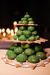 Christmas cake with candles. Several cakes decorated for celebration