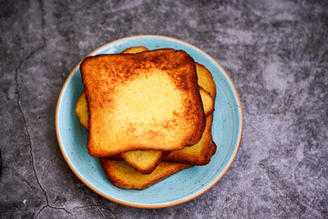 French toast  and white cheese. Rustic breakfast  made from deep fried   bread   with organic free range   eggs