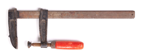 Big old metal clamp or Joiner clamp wood tools, isolated