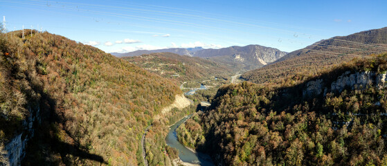 view of the valley of the Mzymta river with built structures in Adler