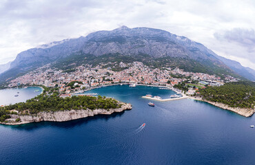 Fototapeta na wymiar Beautiful coastline on the Riviera Makarska on Adriatic sea in Croatia, tourist resorts and beach, overhead view