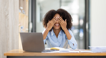 Portrait of tired young business african american woman work with documents tax laptop computer in office. Sad, unhappy, Worried, Depression, or employee life stress concept 