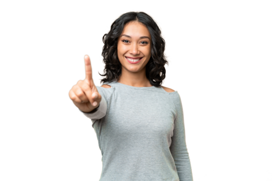 Young Argentinian woman over isolated background showing and lifting a finger