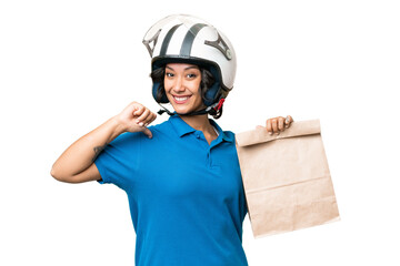 Young Argentinian woman taking a bag of takeaway food over isolated background proud and self-satisfied