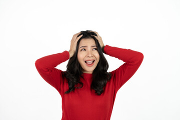 Beautiful young Asian girl thinking and looking upwards. The concept of content thinks about future isolated on white background.