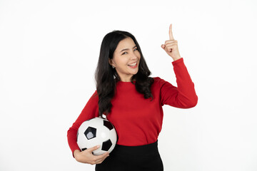 Happy Asian woman football fan cheer up support favorite team with soccer ball isolated on white background.