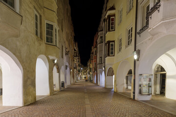 Fototapeta na wymiar Brixen street by night, Northern Italy