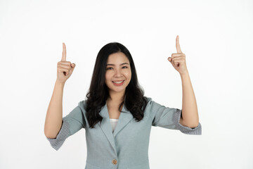 Asian business woman isolated on white background pointing to the side to present a product.