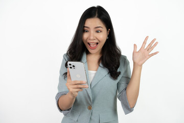 Fototapeta premium Surprise asian beautiful woman using smartphone isolated on white background.
