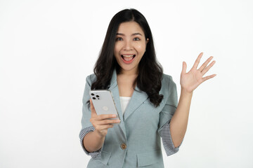 Fototapeta premium Surprise asian beautiful woman using smartphone isolated on white background.
