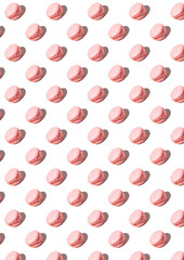 Pattern with strawberry macarons and white background