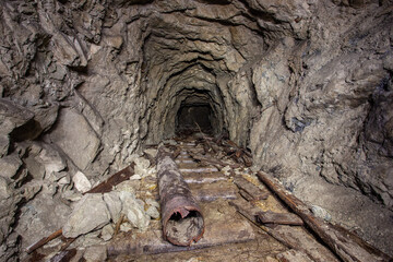 Old iron gold mine underground tunnel