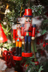 nutcracker: new year, christmas decoration toy on snowy fir free