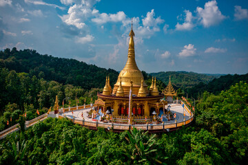 Aerial view of Bandarban temple with golden dome and big statue, Bandarban, Chittagong province, Bangladesh.