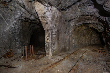 Fototapeta na wymiar Old iron ore mine underground tunnel two way drift